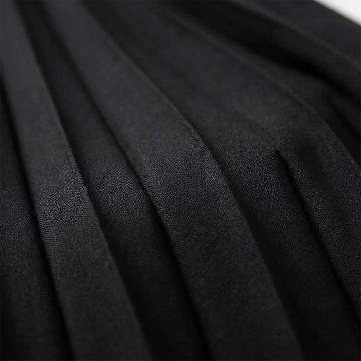Korkeavyötäröinen pleated midi hame